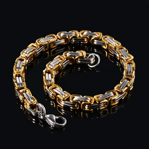 Two-tone Byzantine style titanium steel bracelet for men with lobster clasp on black background