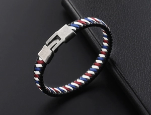 Detailed view of the multi-colored woven leather bracelet with matte silver alloy buckle