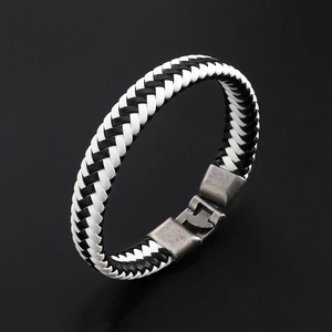 Braided black and white leather bracelet for men featuring a vintage metal clasp closure