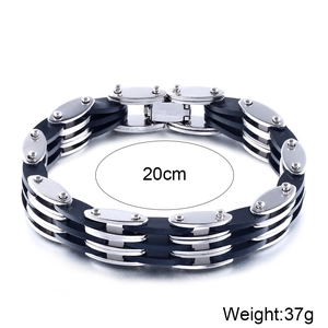 Detail of multi-layer stainless steel and black silicone men's bracelet with 20cm length tag