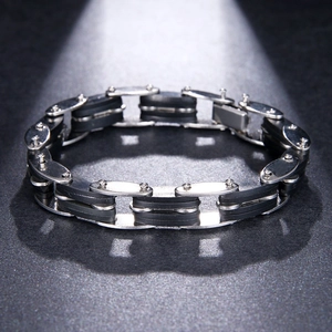 Industrial stainless steel bike chain bracelet with black silicone links and silver accents