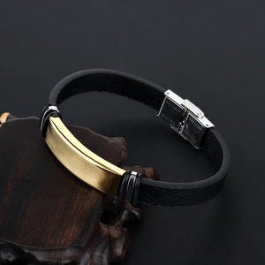 Bracelet pour homme en cuir noir avec plaque dorée polie et fermoir en acier inoxydable