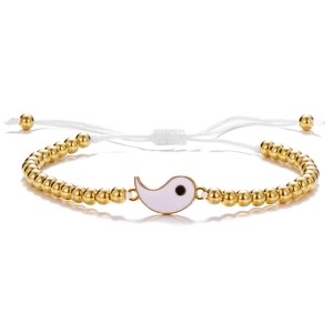 Detailed view of woven Tai Chi bracelet with golden beads and white enamel yin yang charm