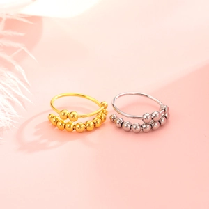 Adjustable anti-anxiety spinner ring set with movable beads in gold and silver finish