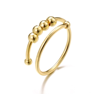 Adjustable golden fidget ring with four sliding beads for stress relief and anxiety