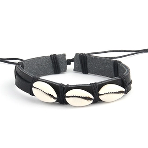 Handmade woven leather shell bracelet with Hawaiian style and adjustable black cord