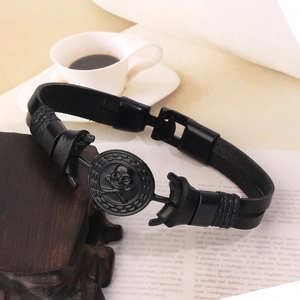 Vintage punk skull charm bracelet with black braided leather strap and metal clasp