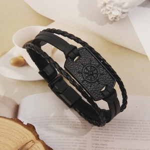 Vintage black braided leather bracelet for men featuring a nautical ship wheel metal charm