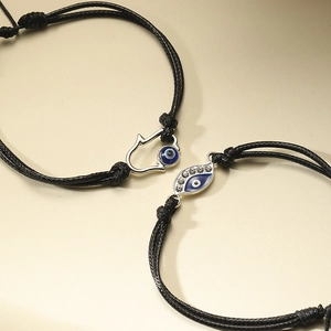 Bracelets cordon noir ajustable avec charms Main de Fatma et mauvais œil argentés