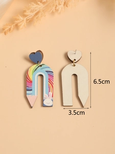 Detail showing u-shaped wooden pencil earrings with rainbow print and size specs