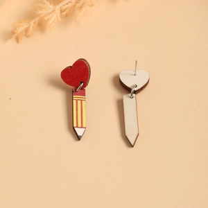 Close-up of wooden teacher appreciation earrings featuring red heart and pencil designs