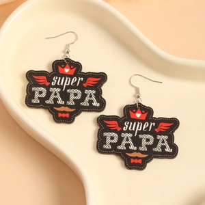 Detail of wooden Super Papa Father's Day drop earrings with crown and mustache print