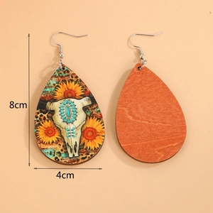 Orecchini a goccia stile western con teschio di toro e girasole misura 8cm x 4cm