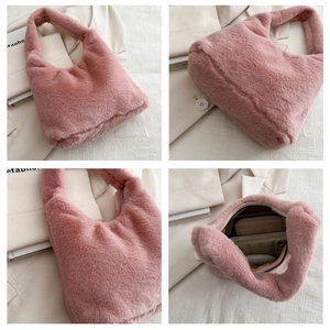 Detail view of pink plush handbag showing soft texture and spacious interior capacity