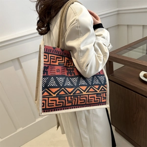 Ethnic style large tote bag with geometric tribal print and woven handles for women
