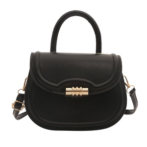 Classic black leather-style saddle bag with round handle and metal buckle on white background