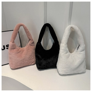 Three plush faux fur underarm bags in pink, black, and white colors with U-shaped design