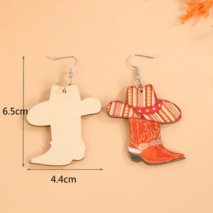 Detail of wooden western cowboy boot earrings with bohemian patterns and dimensions