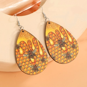 Bohemian teardrop earrings with bee and honeycomb print on lightweight wood material
