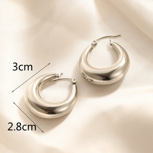 Polished chunky silver hoop earrings displayed on silk fabric with 3cm size measurements