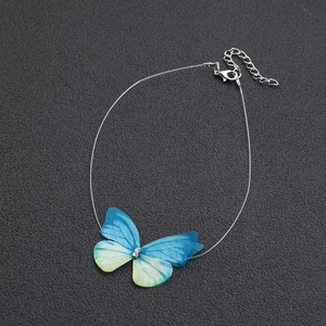 Minimalist invisible butterfly choker with gradient blue tulle pendant and crystals