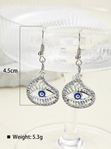 Detailed view of silver evil eye drop earrings with dimensions 4.5cm and 5.3g weight