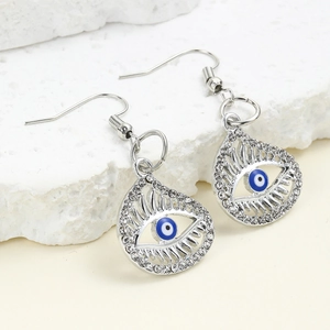Retro evil eye drop earrings with silver heart outline and blue crystals in a clear view