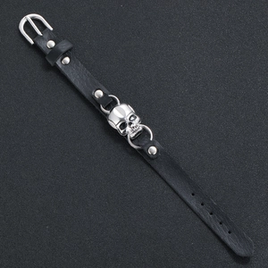 Black leather skull bracelet with silver rivets and buckle in a punk rock style