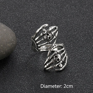 Macro shot of punk gothic skull ring showing 2cm inner diameter and metal texture