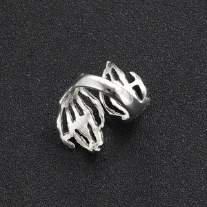 Retro punk gothic silver ring featuring realistic skeletal hands design for men