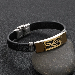 Men's leather bracelet with a gold stainless steel musical note charm and silver clasp