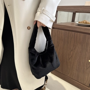 Chic black plush hobo handbag with subtle shimmer, stylish large capacity tote for women