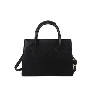 Classic black leather crossbody handbag with dual top handles and gold hardware details