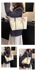 Off-white tote bag with brown handles and printed silk scarf shown in lifestyle scenes