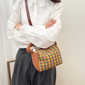 Retro multi-color houndstooth barrel bag with brown corduroy trim and leather strap