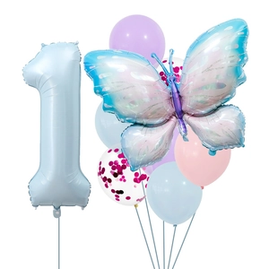 Detail of baby blue number 1 and colorful butterfly foil balloons for birthday party