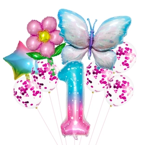 Detail van 40-inch blauw verloop nummer 1 ballon met vlinder en bloemige decoraties
