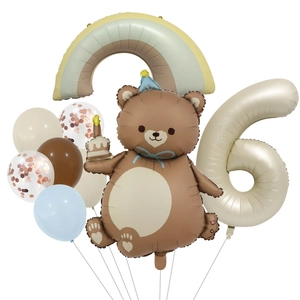 Birthday balloon set featuring a brown bear with cake, rainbow, and cream number 6 balloon