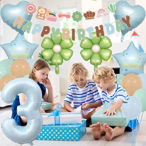 Macro shot of blue number 3 balloon and Happy Birthday banner for 3rd birthday party set