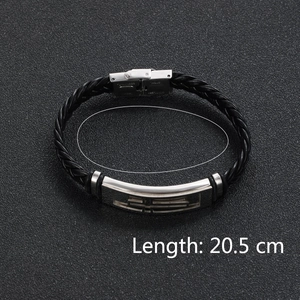 Detail view of woven leather bracelet with stainless steel clasp and 20.5 cm length mark
