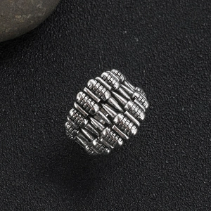 Gothic skull tooth ring in vintage punk style with aged silver finish for men and women