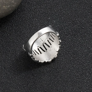 Gothic skull tooth ring in vintage punk style with silver alloy finish and beaded edge detail