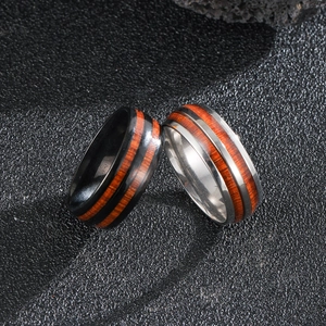 Men's stainless steel rings featuring wood grain inlay in black and silver finishes