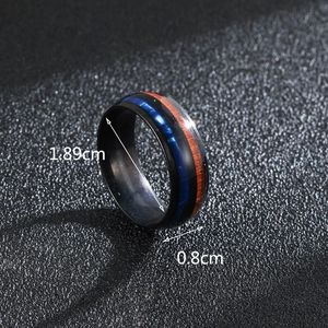 Detail view of men's titanium ring with blue opal and acacia wood inlay measurements