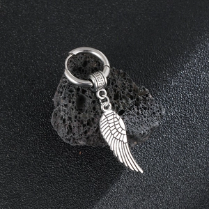 Boucle d'oreille rétro en acier inoxydable avec pendentif aile sur pierre volcanique