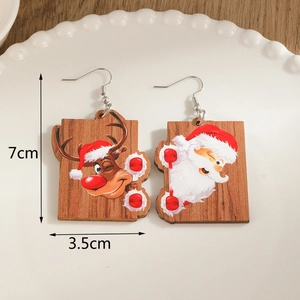 Detailed view of wooden Christmas earrings with Santa and reindeer motifs showing 7cm size
