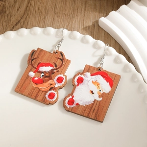 Handcrafted wooden Christmas earrings featuring Santa Claus and reindeer cartoon patterns