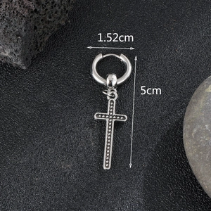 Detailed view of cross pendant earring with dimensions showing 5cm length and relief texture