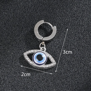 Macro view of evil eye hoop earring with crystal pavé and 3cm by 2cm size dimensions