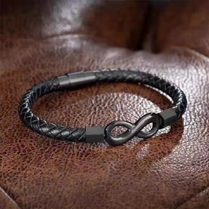 Men's black braided leather infinity bracelet with matte black magnetic cylinder clasp